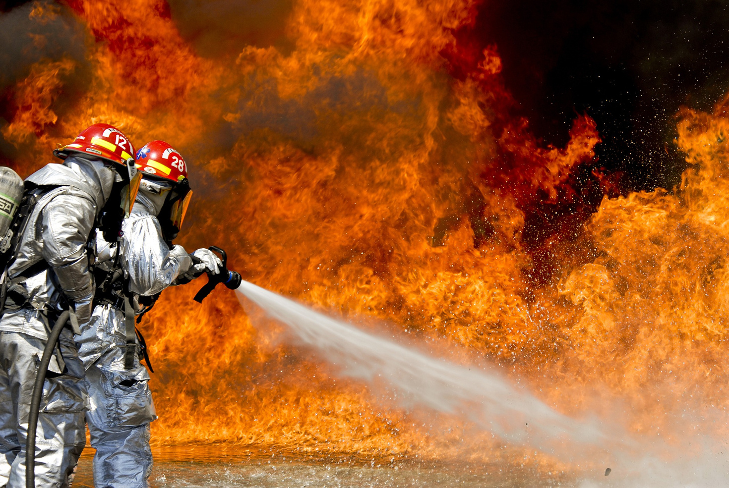 Firefighter Putting Out Fire